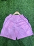 Shorts rosa del Inter de Miami con detalles en negro y logo del equipo.