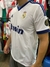 Camiseta del Real Madrid 2013/2014 de Cristiano Ronaldo, color blanco con detalles azules y el logo de Bwin.