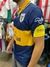 Camiseta retro de Boca Juniors, modelo "Olan Maradona Parmalat" de 1996, vista lateral con detalles en azul y amarillo.