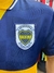 Camiseta retro de Boca Juniors con el escudo de 90 aniversario y colores azul y amarillo.