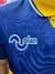 Detalle del logo "olan" en la camiseta retro de Boca Juniors, modelo 1996.