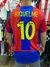 Camisa retro del FC Barcelona de la temporada 2002/03 con el nombre "Riquelme" y el número 10 en la espalda.