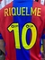 Camiseta retro del FC Barcelona de la temporada 2002/03 con el nombre "RIQUELME" y el número 10 en amarillo.