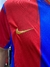Camiseta retro del FC Barcelona 2002/03, destacando el logo de Nike en dorado.