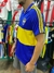 Camiseta de Boca Juniors en color azul y amarillo, con el escudo del club en el pecho.