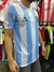 Camiseta titular de la Selección Argentina, modelo Maradona 1986, con rayas celestes y blancas.