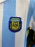 Detalle del escudo de la selección argentina en la camiseta Maradona 1986 titular Lecopp.