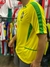 Camiseta retro de Brasil, modelo campeón del mundo 2002, con el número 11 y detalles en verde y amarillo.