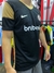 Camiseta de fútbol negra con detalles dorados de San Lorenzo, modelo Piel de Cuervo, con logo de Nike y patrocinador Brubank.