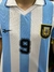 Camiseta de la selección argentina, modelo 2000 de Reebok, con franjas celestes y blancas y el número 9.