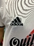 Camiseta de fútbol River Plate, modelo retro Aimar 2001/2002, con logo de Adidas y patrocinador Quilmes.