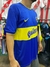 Camiseta retro de Boca Juniors de color azul y amarillo, con el logo de Quilmes, año 2000.