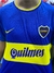 Camiseta retro de Boca Juniors, año 2000, en azul y amarillo, con el logo de CABJ y la marca Quilmes.
