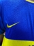 Camiseta retro de Boca Juniors, año 2000, con diseño en azul y amarillo, mostrando el logo de Nike en el pecho.