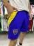 Short de Boca Juniors de Adidas en tonos azul y amarillo, con el escudo del club en la pierna.