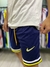 Short de Boca Juniors Nike retro en color azul marino con detalles amarillos y logo de Nike.