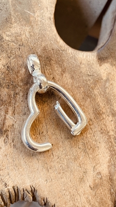 Dije, Porta dijes - Lena Kaupert joyeria