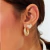 Brinco coração cravejado de zircônias. Banhado a ouro 18k.