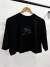 REMERA CUPIDO NEGRO en internet