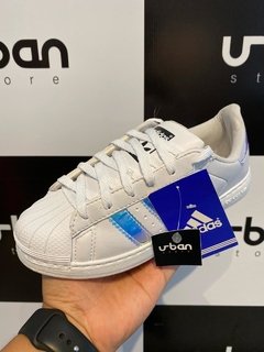 Tênis Adidas Superstar Branco C/Listras Azul (Feminino) na internet