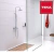 Grifería de baño Teka modelo Universe Pro con ducha de barra, instalada en un baño moderno y minimalista.
