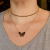 COLAR CHOKER RÍGIDO ZIRCÔNIAS NEGRAS na internet
