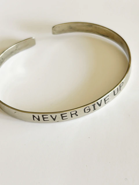 NEVER GIVE UP