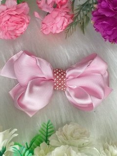 Laço rosa com pérolas