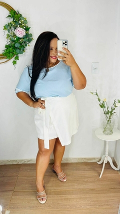 BLUSA BICOLOR COM DETALHE na internet