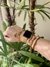Pulseira dourada laços - comprar online