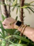 Pulseira dourada laços - comprar online