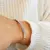 Pulseras de hilo con bolitas plata en internet