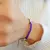 Pulseras de hilo con bolitas plata - Nuestro Hogar Joyas