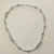 Collar bolitas acero blanco - Nuestro Hogar Joyas