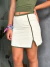 Short saia off white com friso