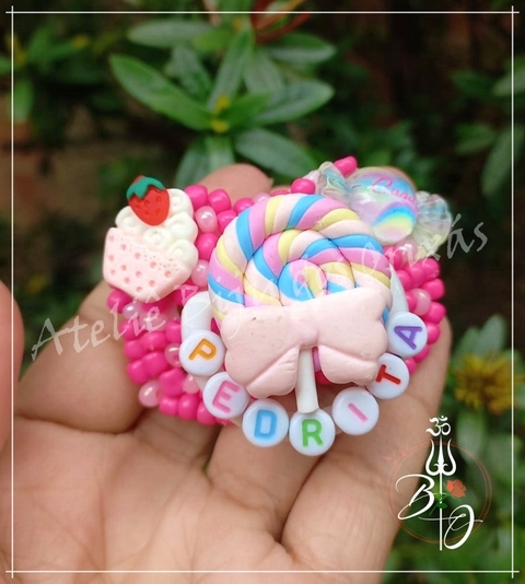 Chupeta Erê Rosa com nome decoração de doces Ateliê biju dos Orixás