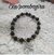 Pulseira de Exu e Pomba Gira Preto e dourado