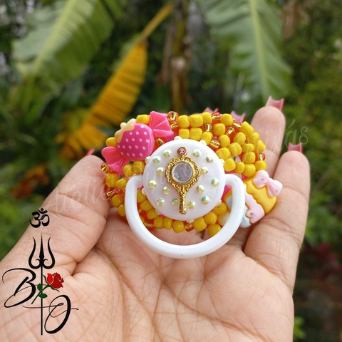 Chupeta Erê Rosa com amarelo com espelhinho