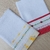 Fraldas de boca Barrado Bordado Flor - babete - 100% algodão - comprar online