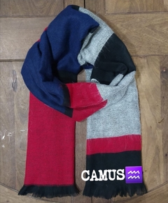 Ruanas gris, rojo, negro y azul