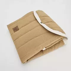 Cambiador de Tusor mostaza con interior impermeable en internet