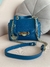BOLSA SATCHEL FLAP AZUL na internet