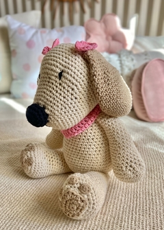 Imagen de perrita con moñitos