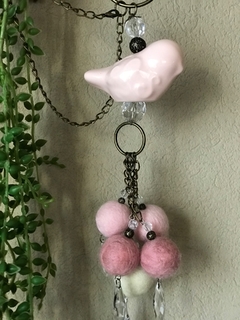 borla pajarita con pompones