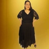 Vestido con lentejuelas en mangas