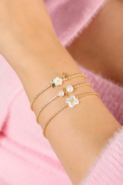 PULSEIRA RIVIERA FLOR DE MADREPEROLA APP na internet