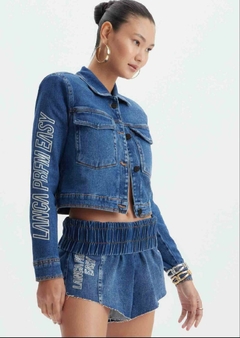 Jaqueta Jeans Trucker Azul Lança Perfume Easy