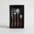 Set x 16 cubiertos acero con mango simil madera, linea Bre en internet