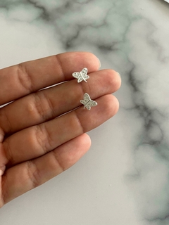 Aritos de plata y cubic mariposas