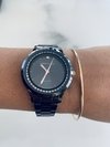 Reloj Knock Out negro y rose gold malla metálica
